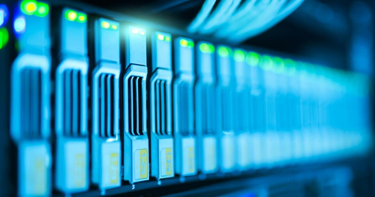 Detailed image of a server rack with glowing lights in a modern data center.