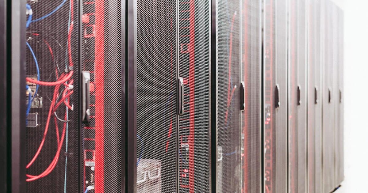 Modern data server room with network racks and cables