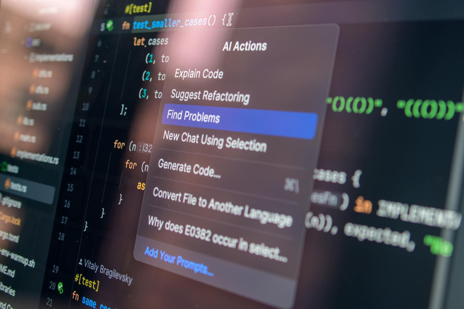 AI-assisted coding with debugging menu on screen