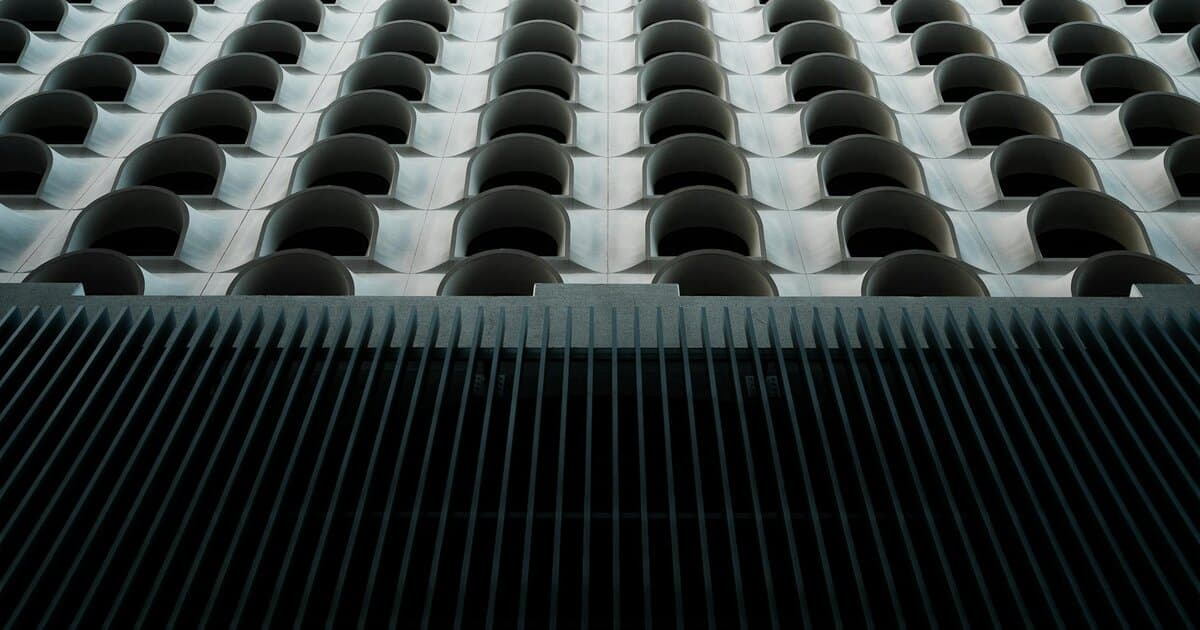 Abstract view of a modern building facade with striking geometric patterns in Phoenix, AZ.