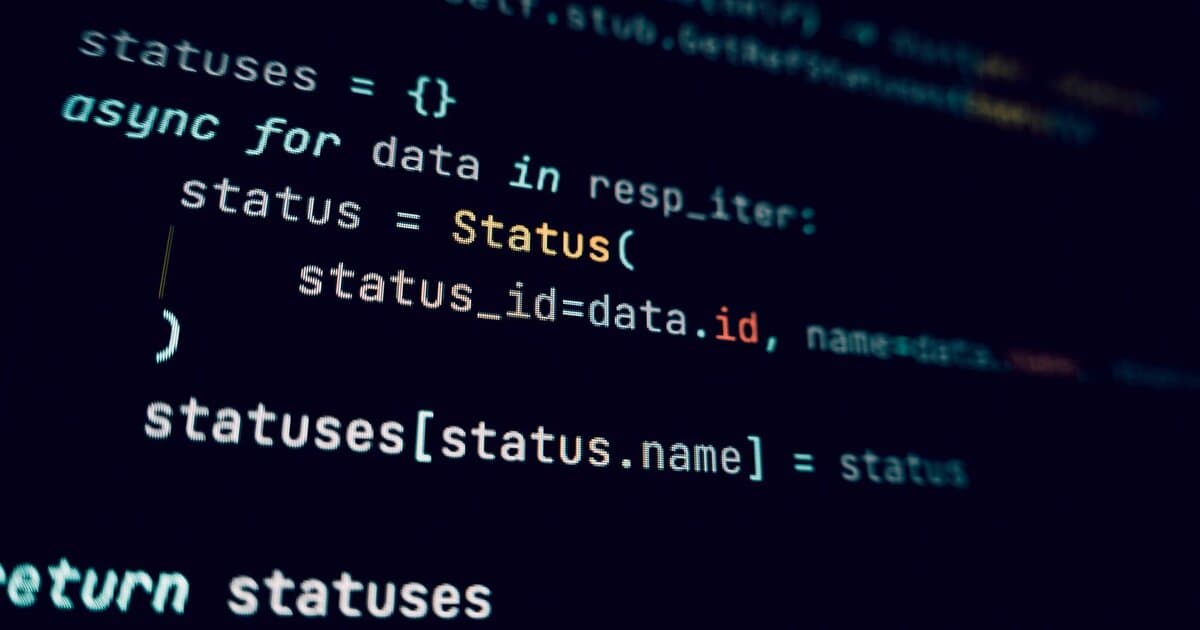 Detailed view of programming code in a dark theme on a computer screen.