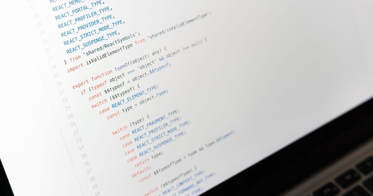 Close-up of JavaScript code on a laptop screen, showcasing programming in progress.