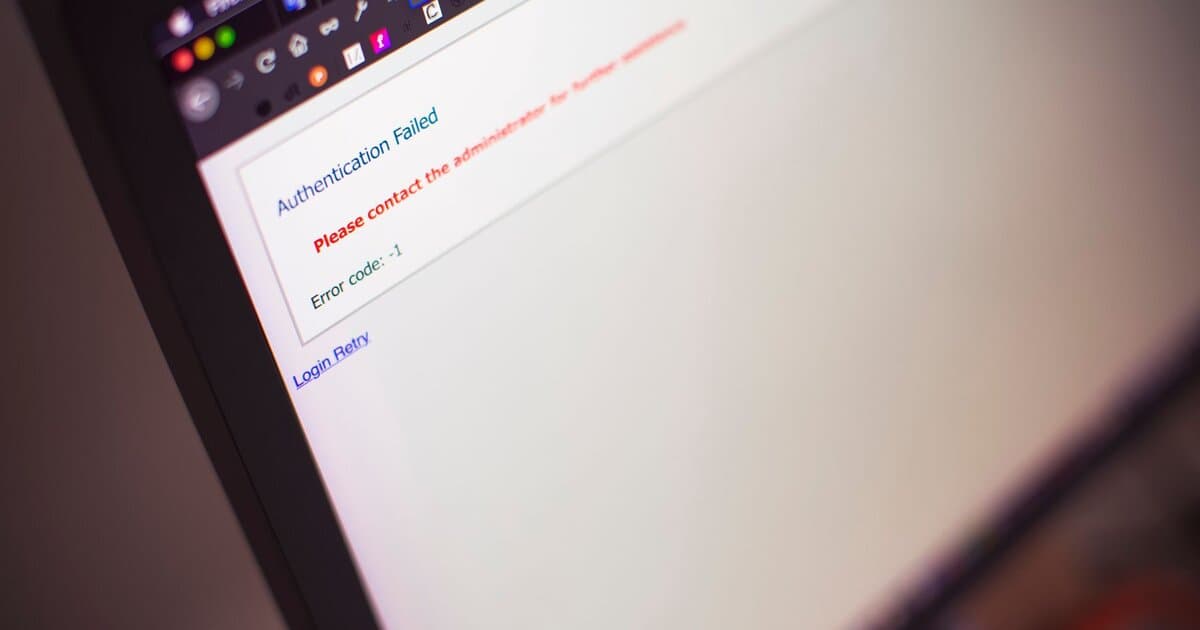 Close-up of a computer screen displaying an authentication failed message.